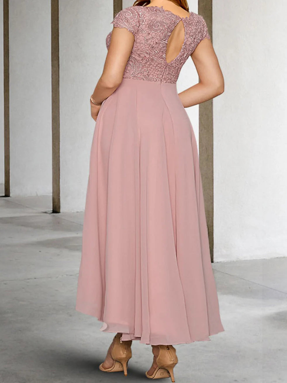 Sophisticated A-line gown for Mother of the Bride, featuring delicate applique sleeves.