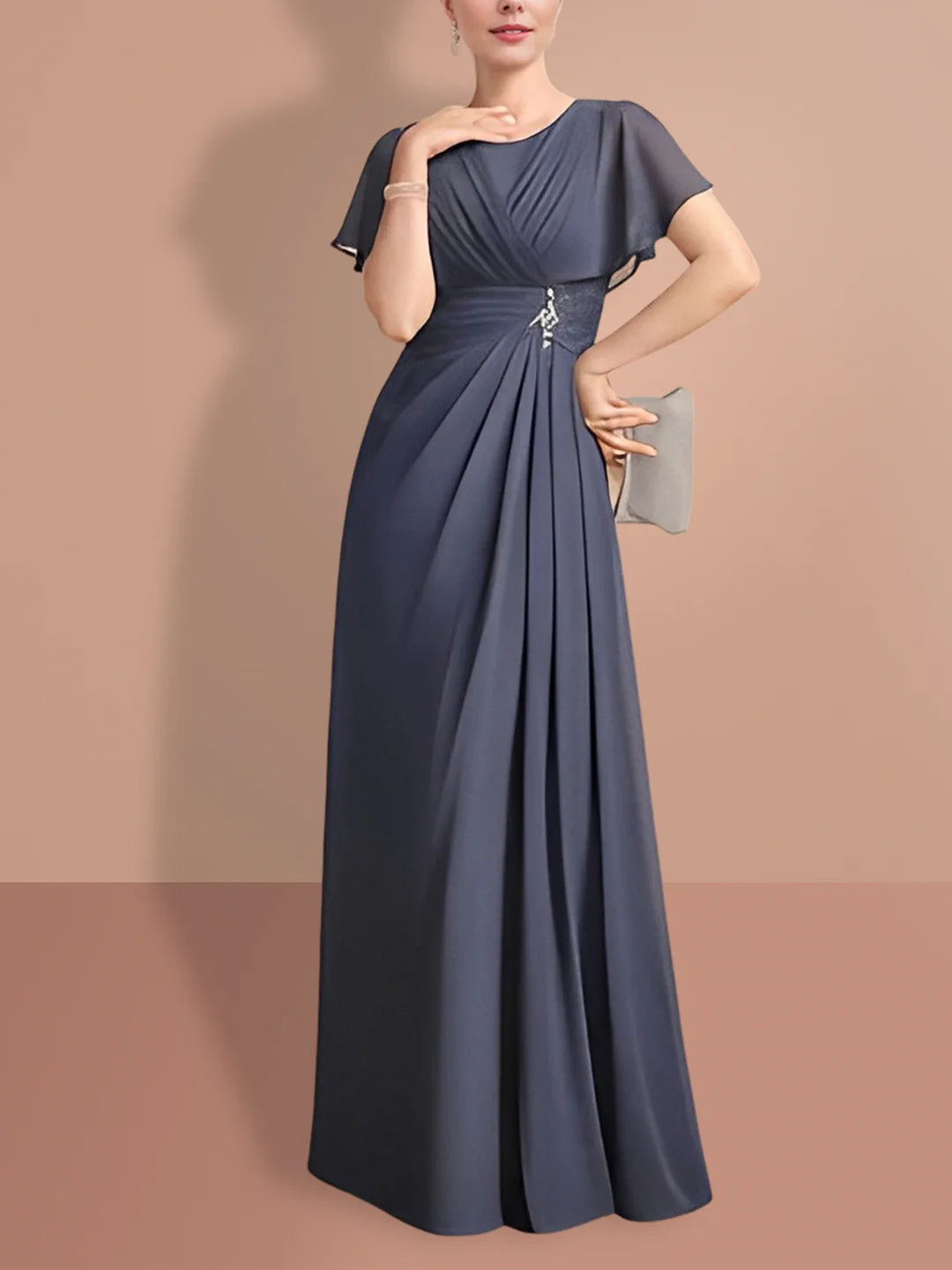 Woman wearing an elegant A-line short sleeve ankle-length Mother of the Bride dress.