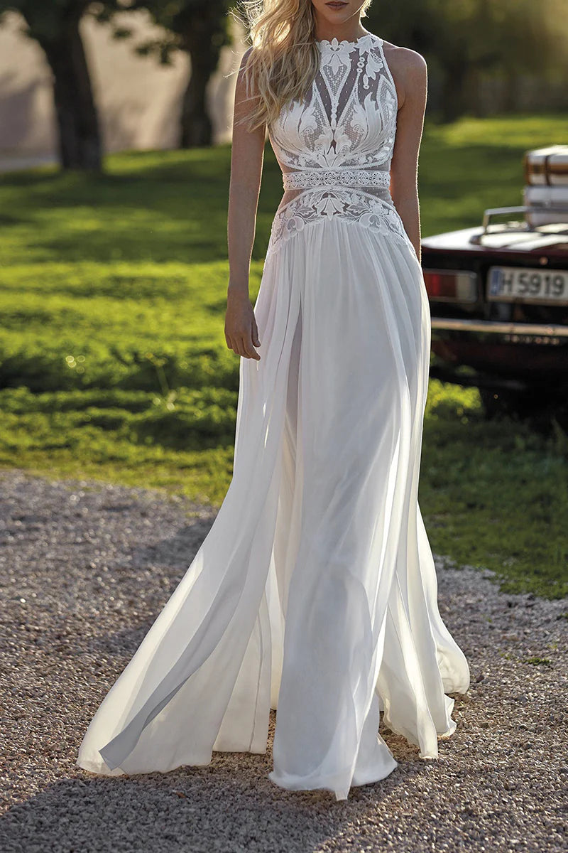 A-Line Bohemian lace and chiffon wedding dress with a flowing skirt.