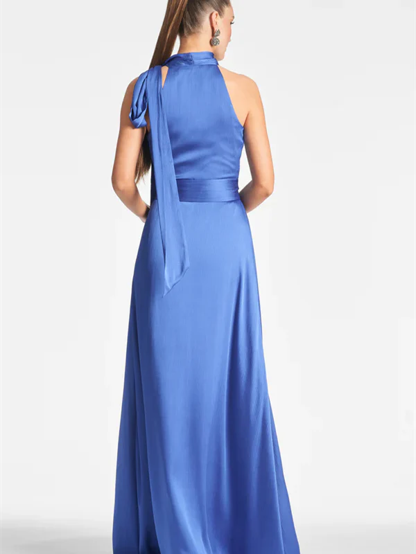 Woman wearing a sophisticated A-line formal dress.