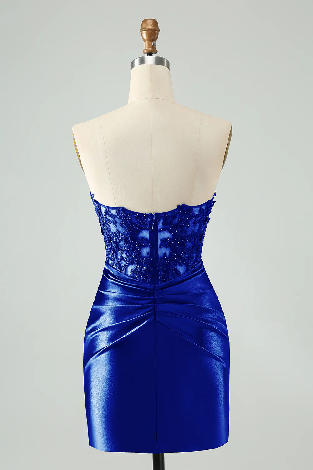 Sparkling sleeveless formal dress featuring glitter and intricate beadwork.