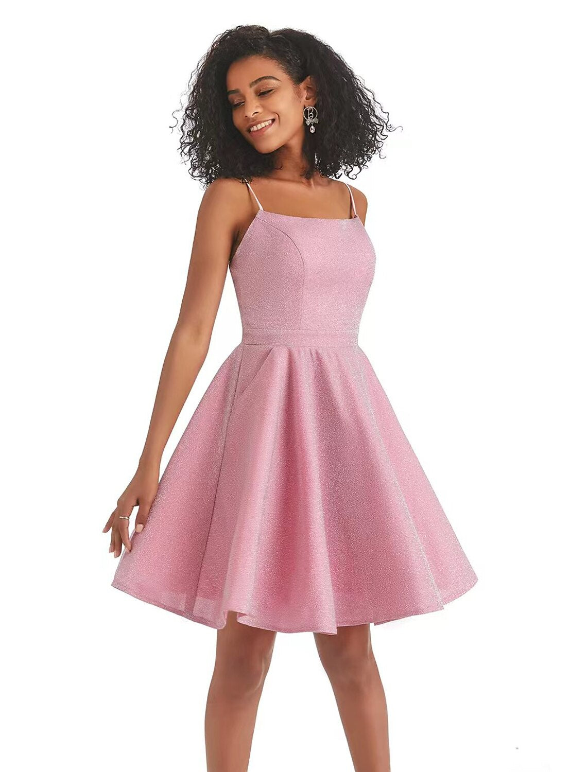 Back view of pink A-line sequin dress, showing backless design.