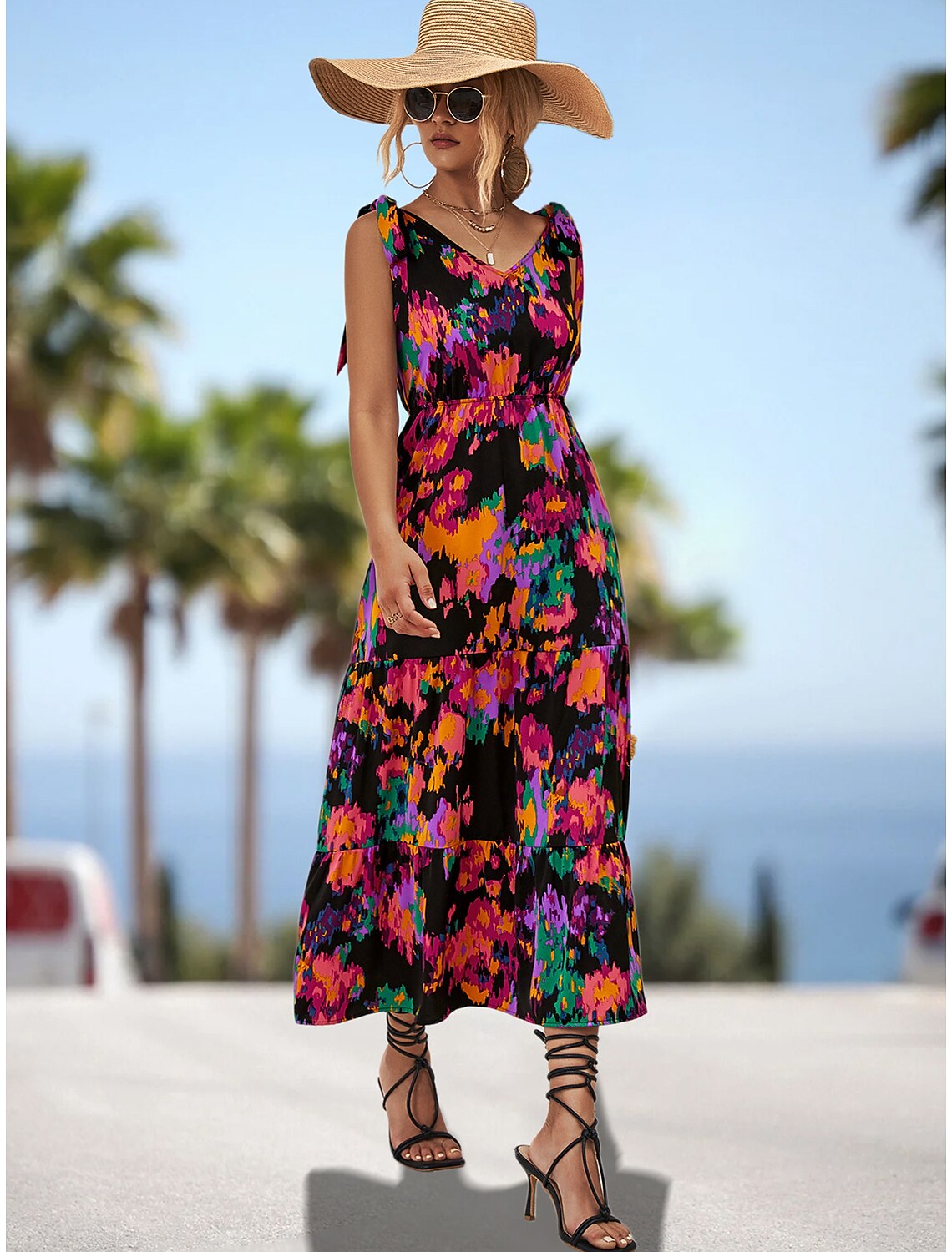 Elegant A-Line wedding guest dress with spaghetti straps and slit.