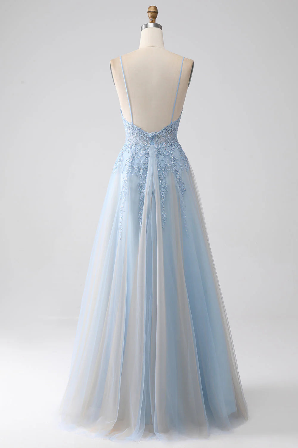Back view of the grey blue A-line prom dress with spaghetti straps and beaded details.