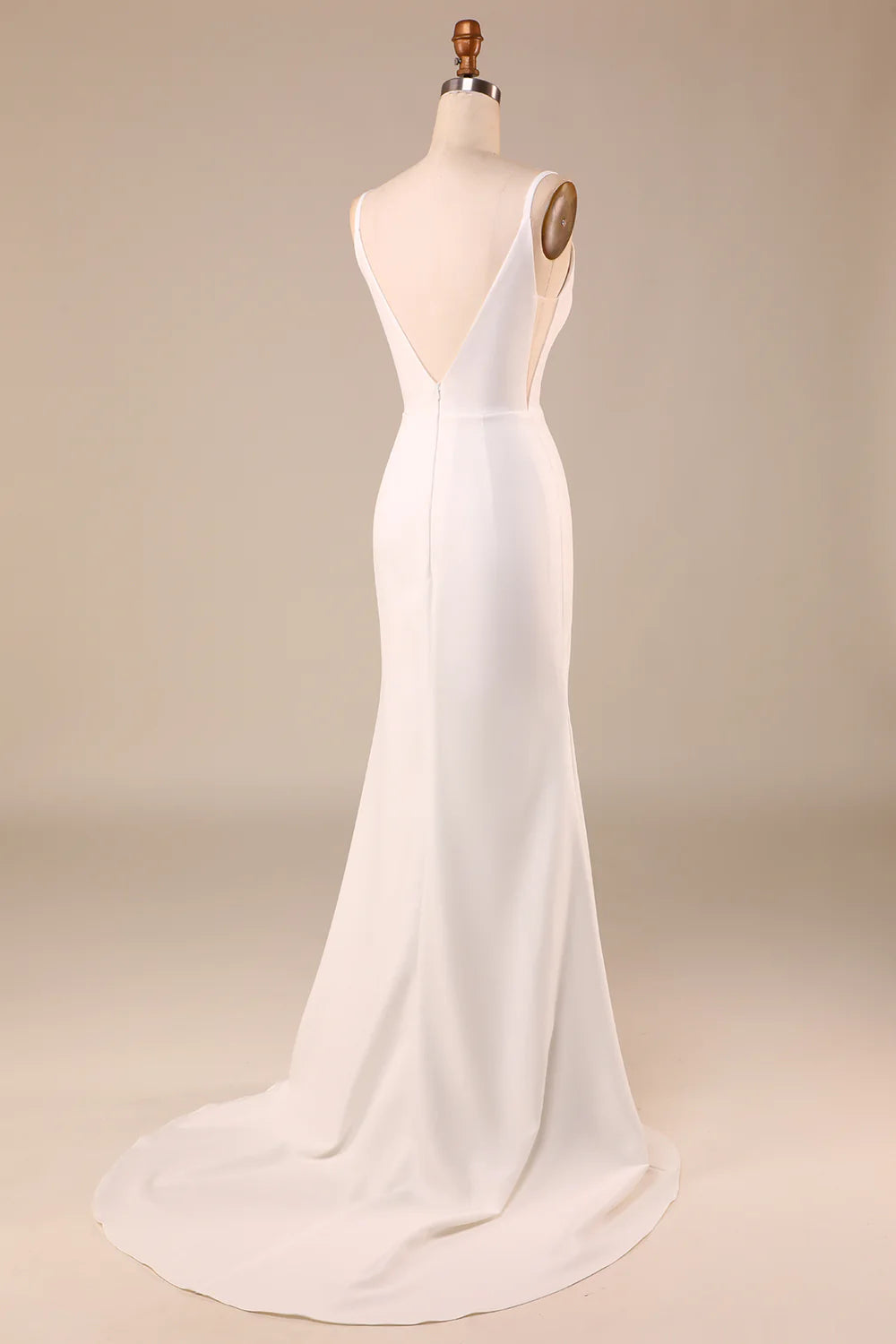 Back view of ivory wedding dress, highlighting button details and sweep train.