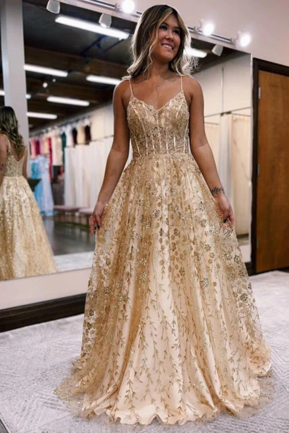 A-Line spaghetti strap corset prom dress in golden.