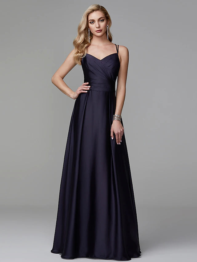 Back view of the A-Line satin gown showcasing the beaded crisscross strap detail.