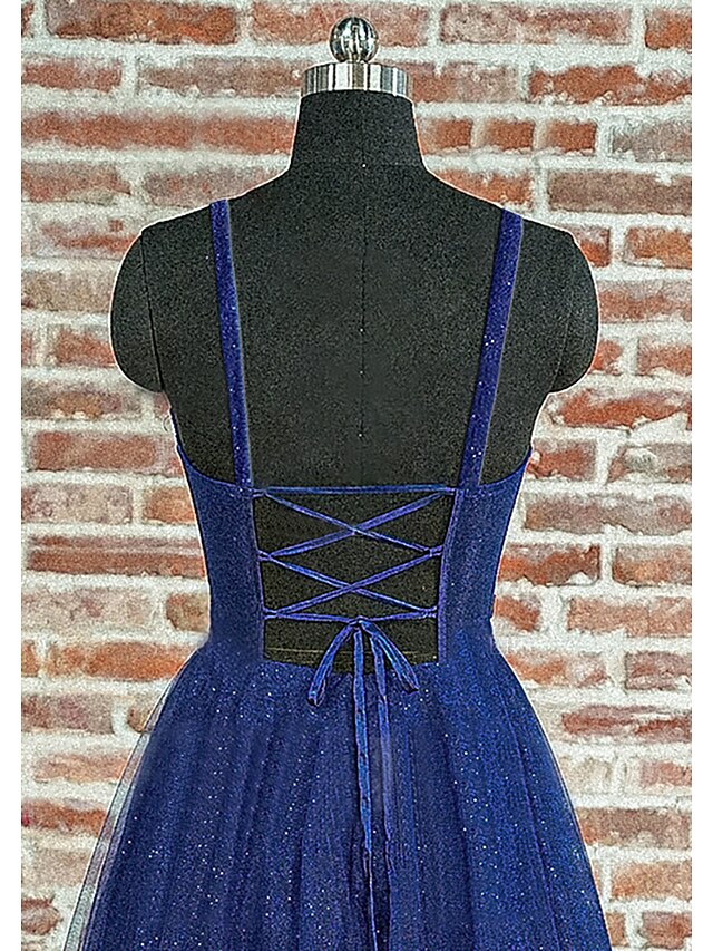 Full view of an A-line spaghetti strap formal dress for special occasions.