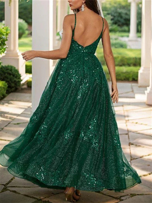 Full view of an A-line spaghetti strap formal dress, showcasing its flowing silhouette.