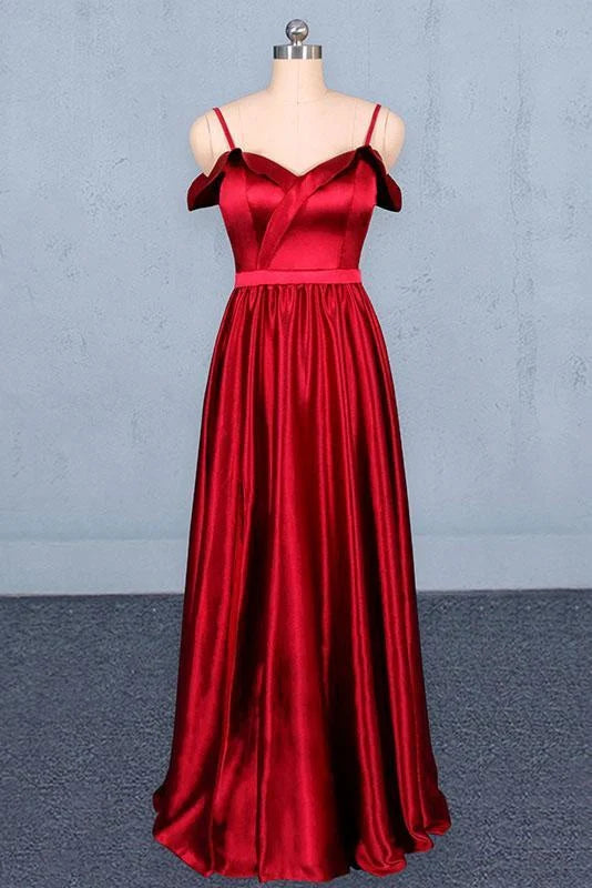 Elegant A-line long prom dress with spaghetti straps, front view.