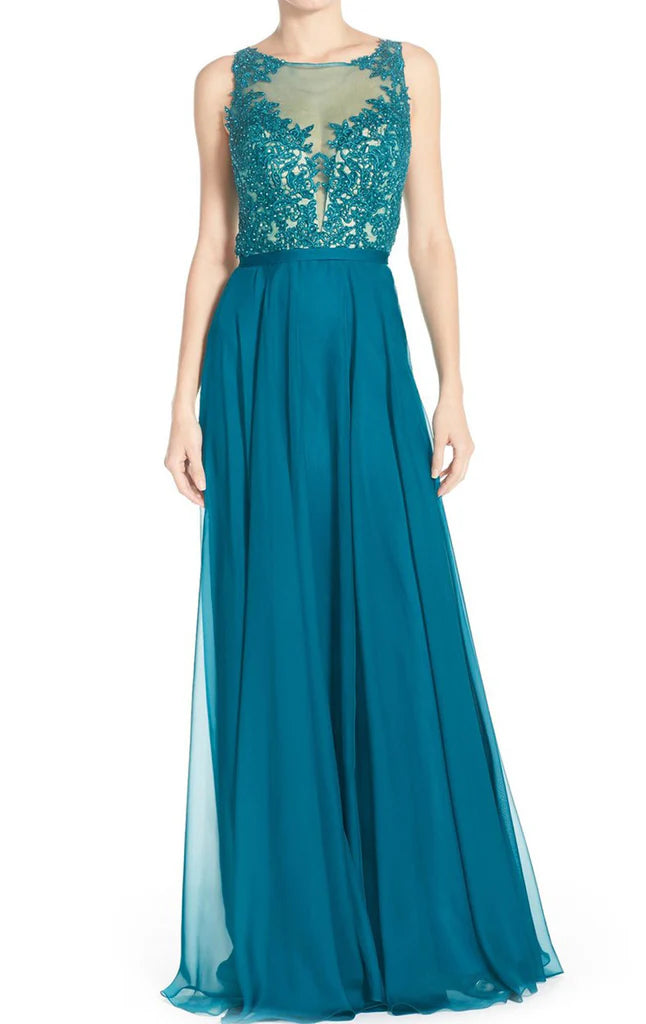 Elegant long formal prom dress with spaghetti straps and lace bodice.