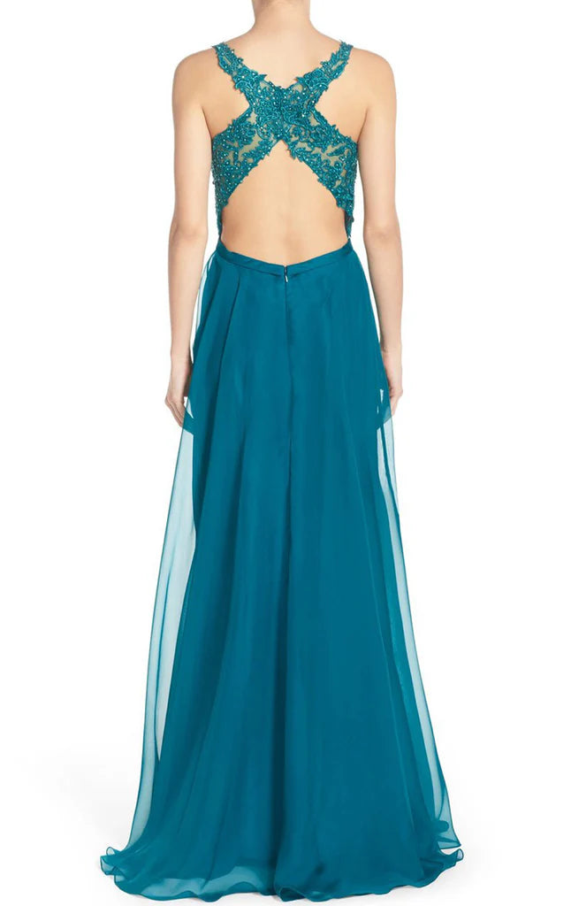 Full length view of a flowing chiffon evening gown.