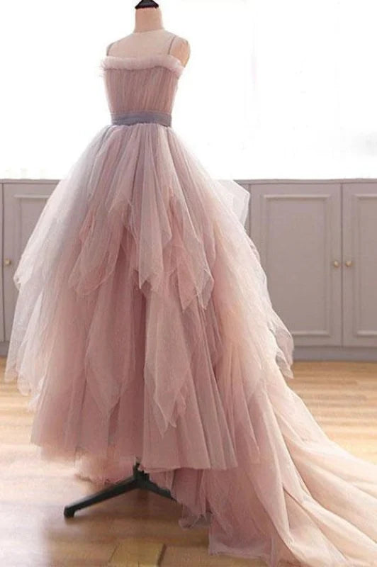 Back view of the A-line spaghetti strap dress with ruffle details.