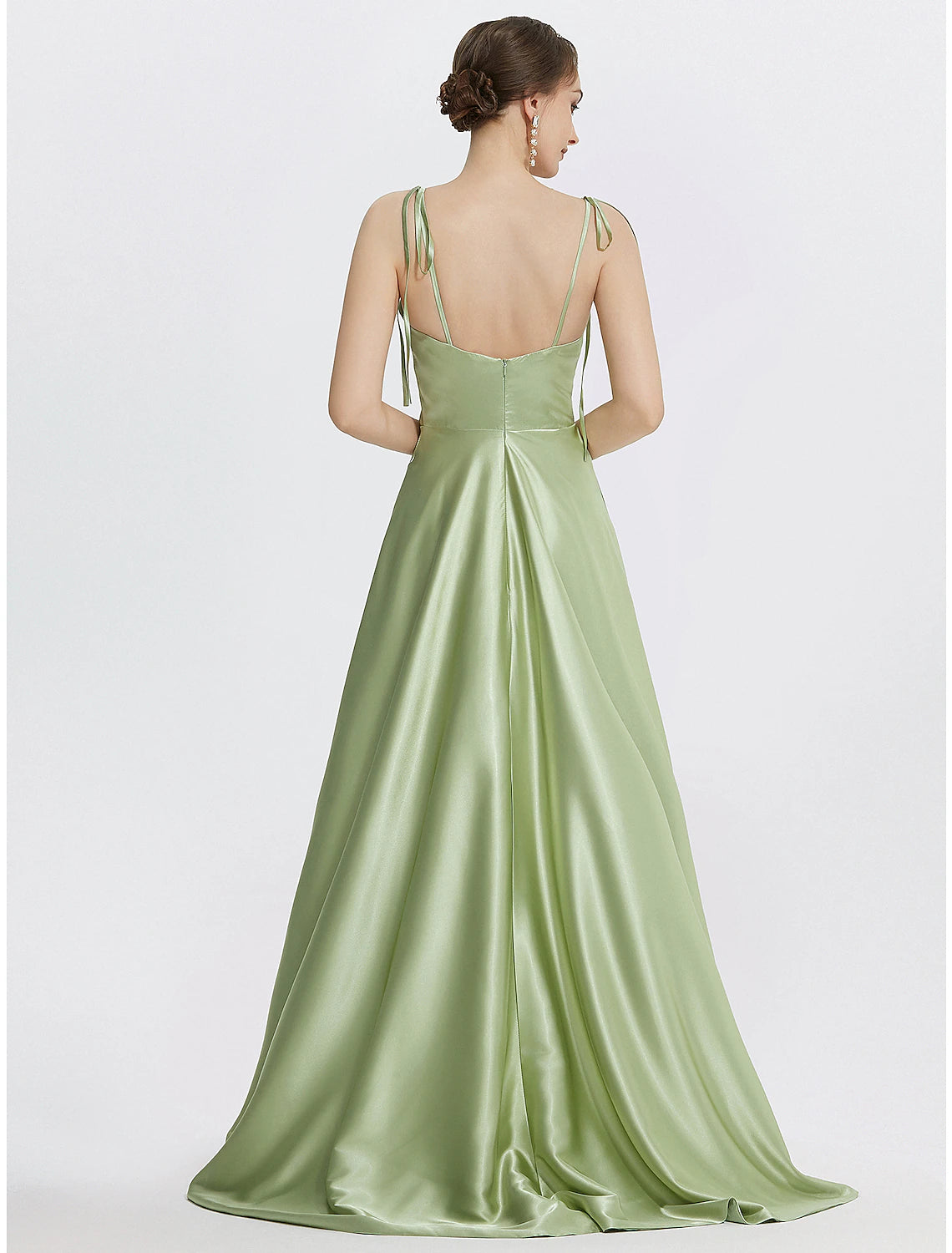 Side view of the A-line satin gown, showcasing the flowing floor-length skirt.