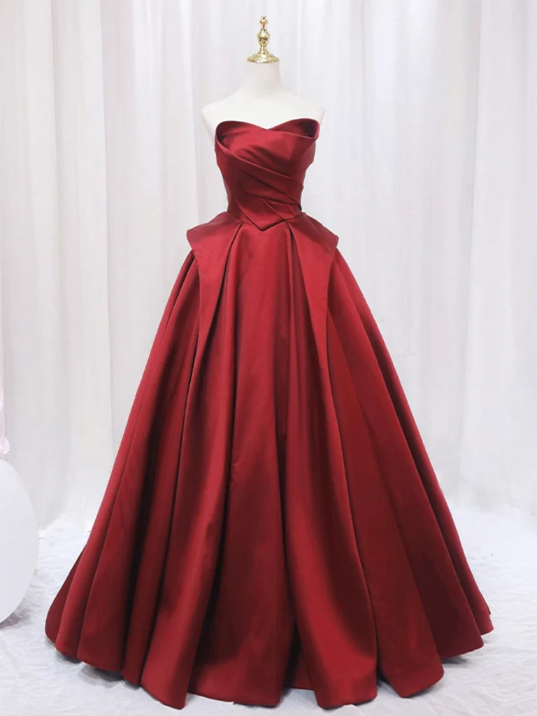 Full view of the dark blue A-line satin long prom gown.