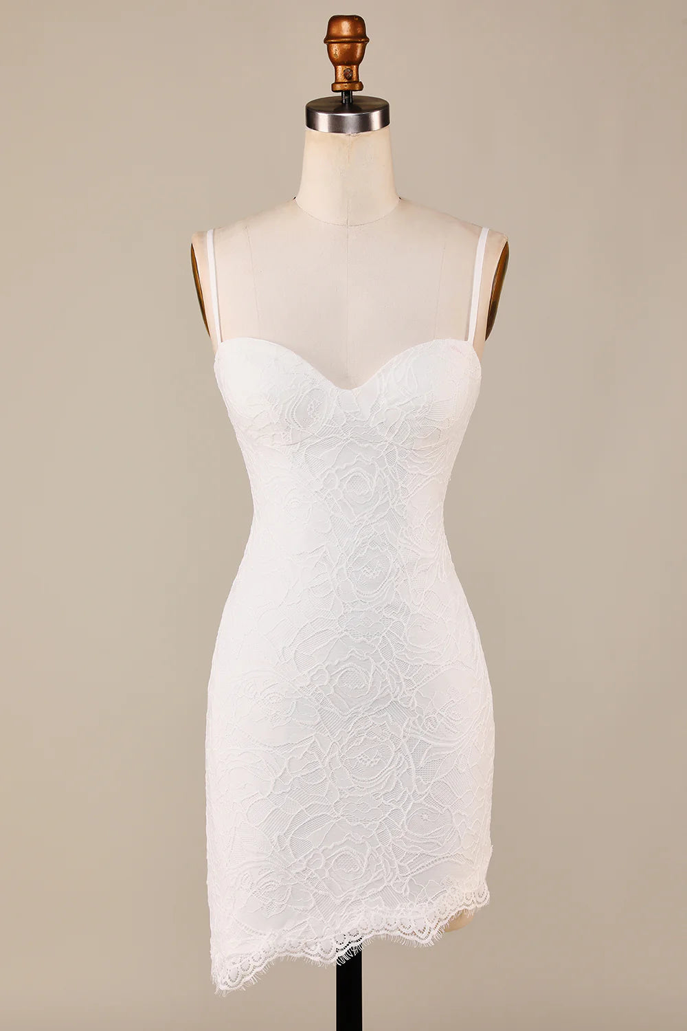 Back view of the flowing ivory tiered lace bridal dress.