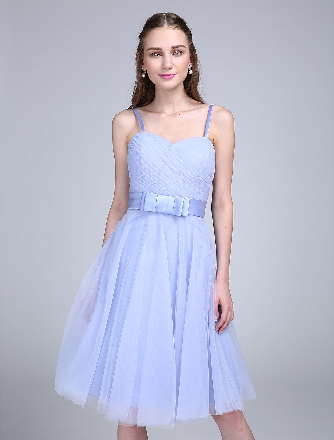 Full length view of A-line tulle dress.