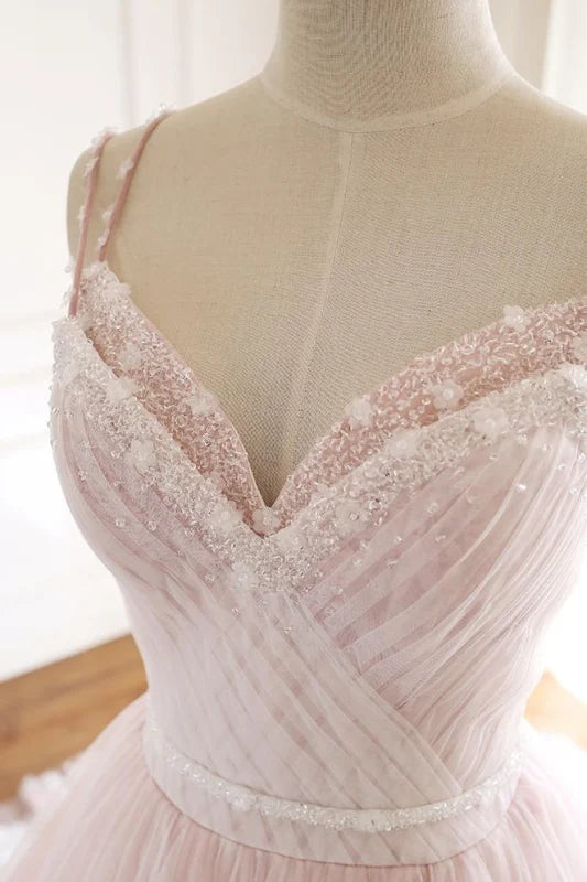 Back view of the A-line prom dress, showcasing the delicate lace appliques on tulle fabric.
