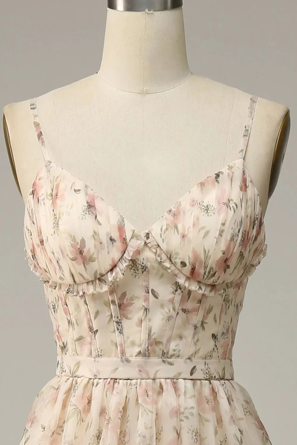 Side view of apricot A-line prom dress, showcasing the high split and print detail.