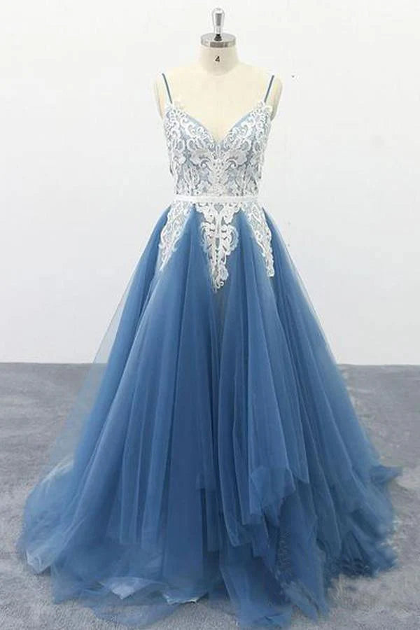 Elegant A-line prom dress with spaghetti straps and appliques.