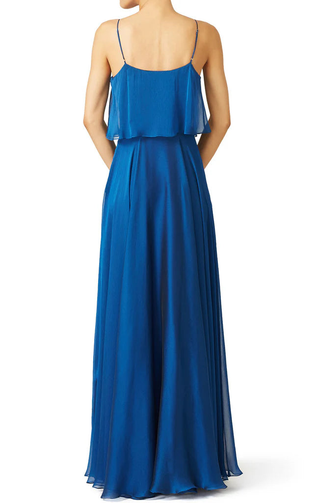 Side view of the flowy chiffon long dress with spaghetti straps.