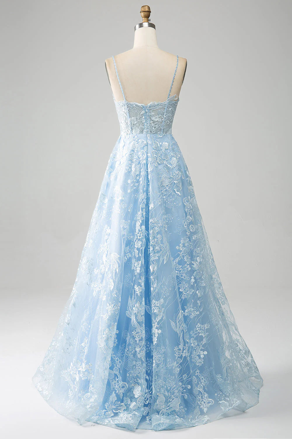 Back view of Sky Blue A-Line prom dress, showing lace details and long skirt.