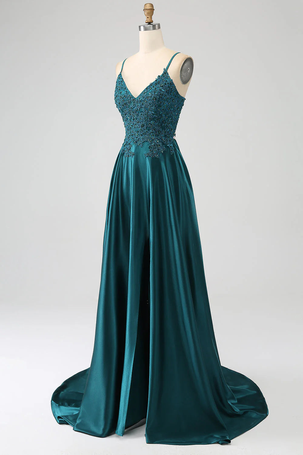 Side view of the elegant peacock green long prom dress with a high slit.
