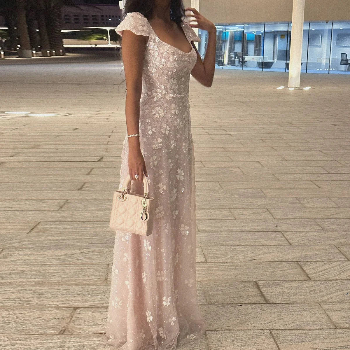 Side view of the pink floral square neck backless maxi prom dress, showcasing the A-line silhouette.