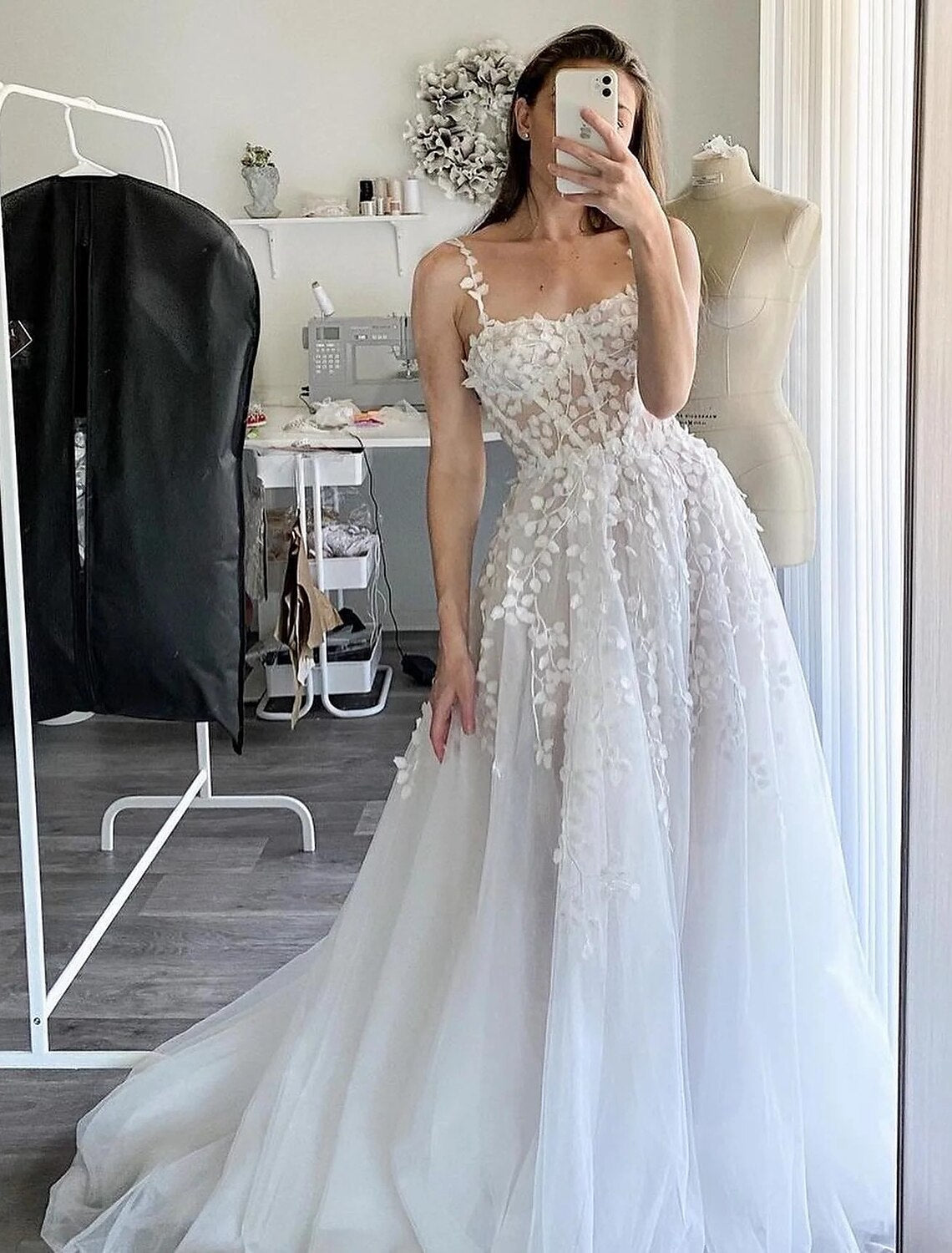 Elegant A-Line chiffon wedding dress with square neckline and delicate embroidery.
