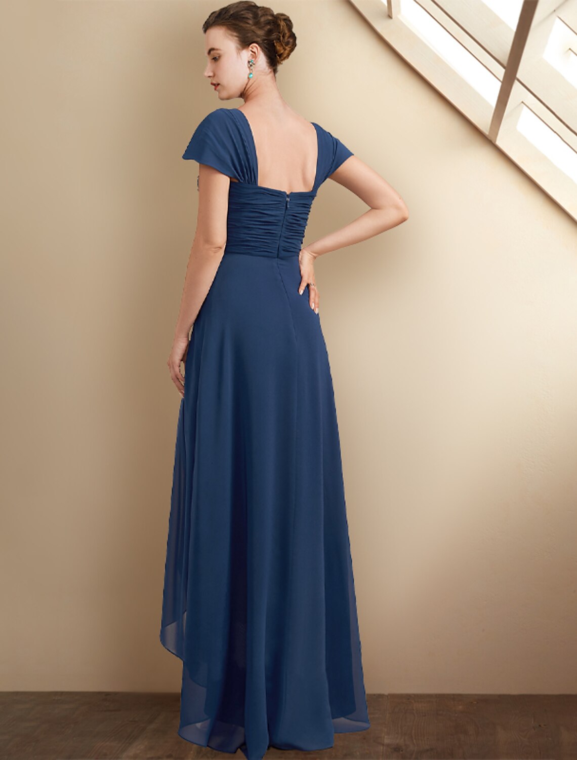 Model wearing the elegant A-Line dress, showing its movement and style.