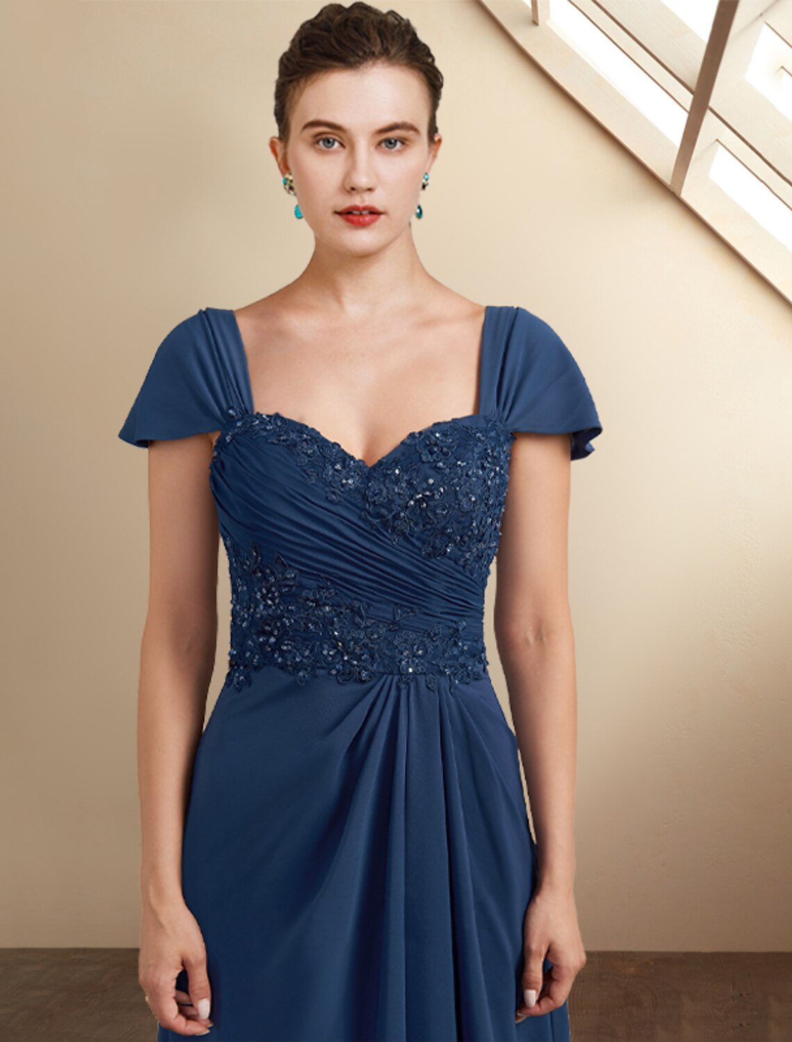 Side view of the dress, highlighting the side-draped detail and asymmetrical hem.