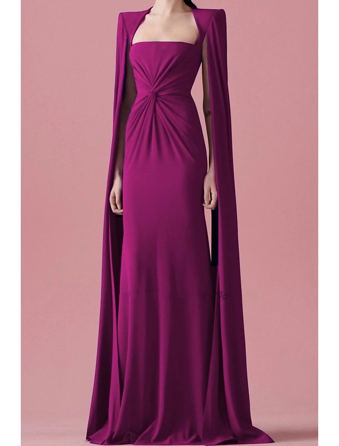 Side profile of the woman in the A-line formal dress, showing the cape detail.