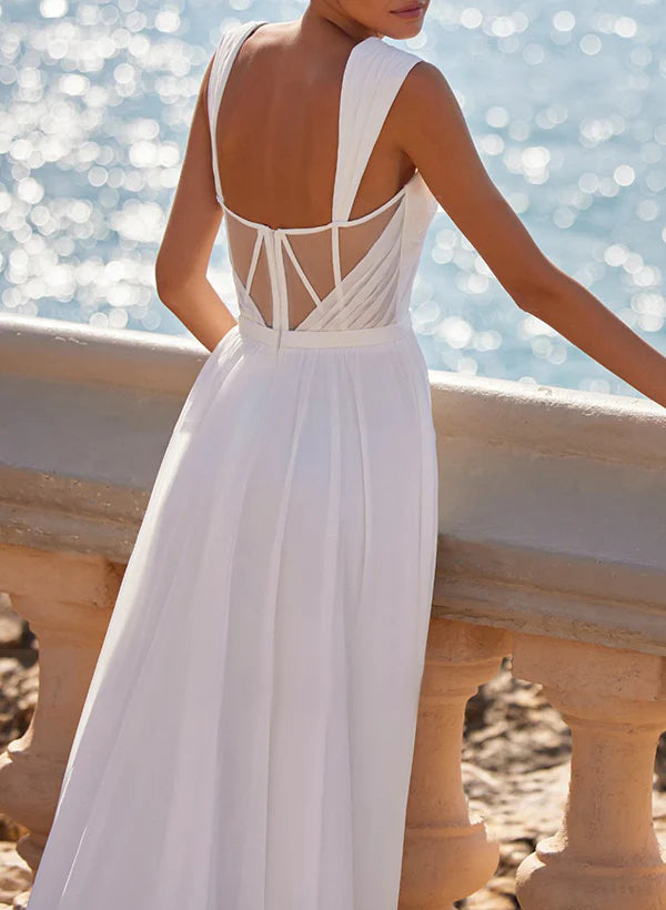 Back view of A-line chiffon wedding dress showing flowing fabric.