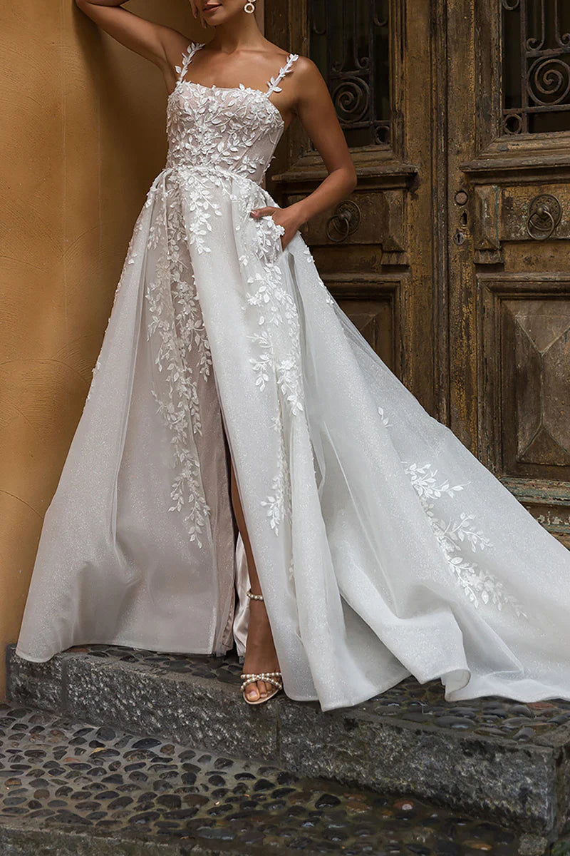 Elegant A-Line wedding dress with square neckline and lace appliques.