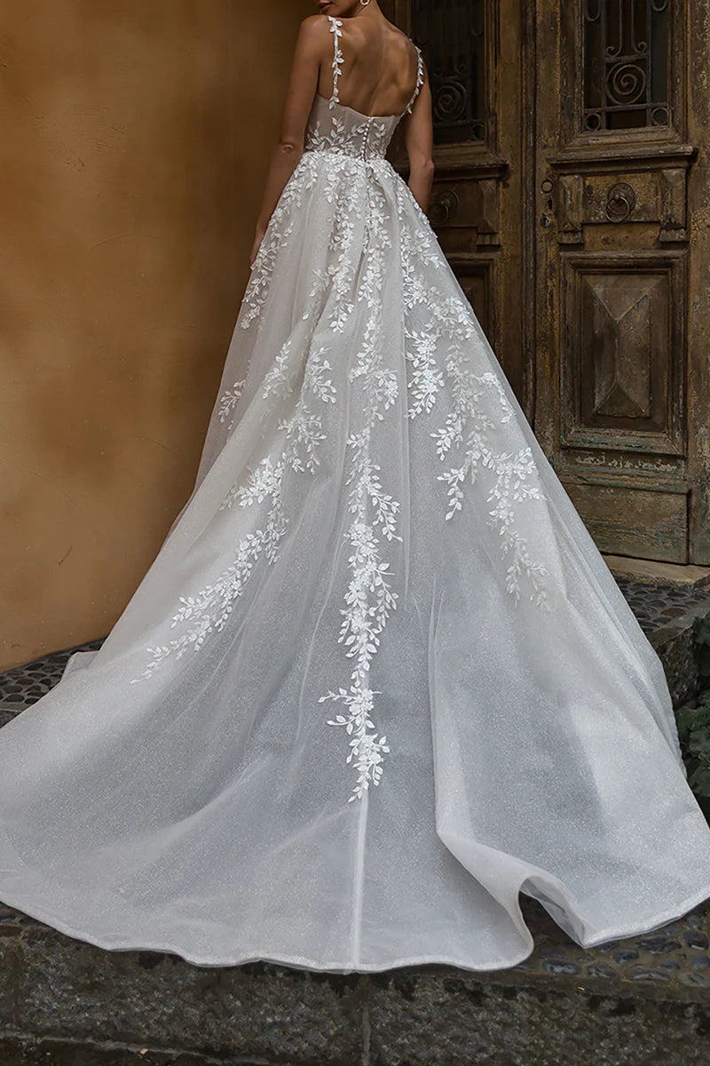 Back view of A-Line wedding dress showing lace details.