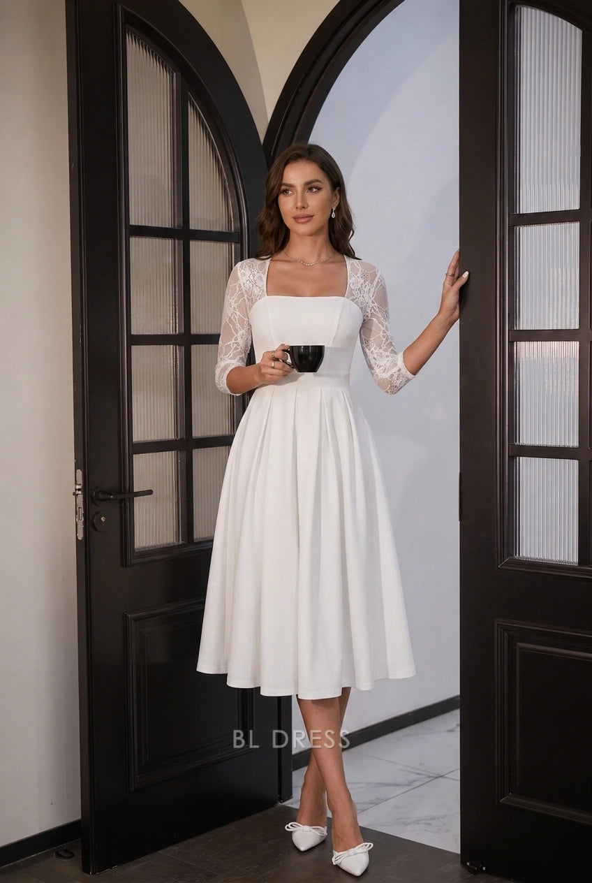 Woman wearing white A-line midi prom dress with square neck and lace sleeves.