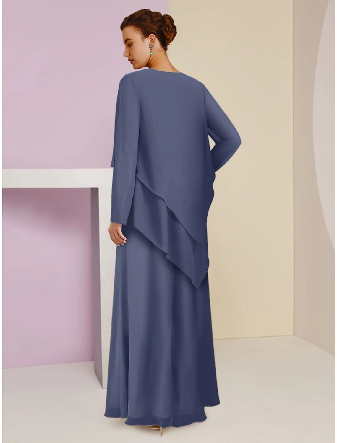 Back view of the A-line chiffon dress showing elegant drape.