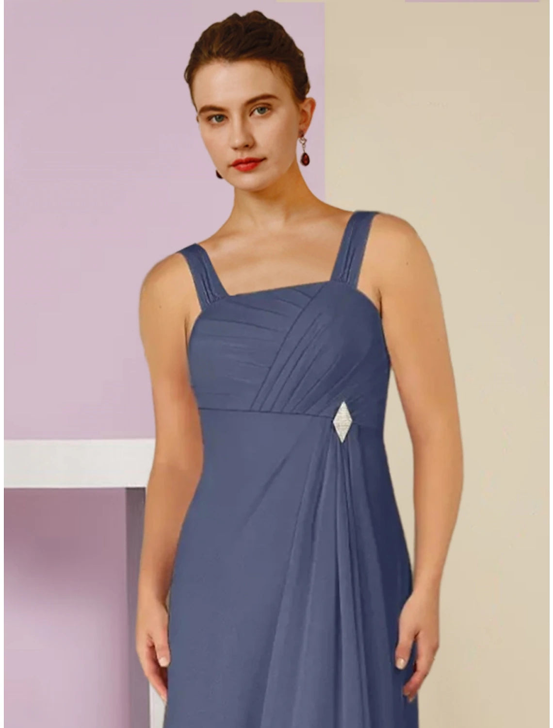 Model wearing the elegant chiffon dress, showcasing its flow.