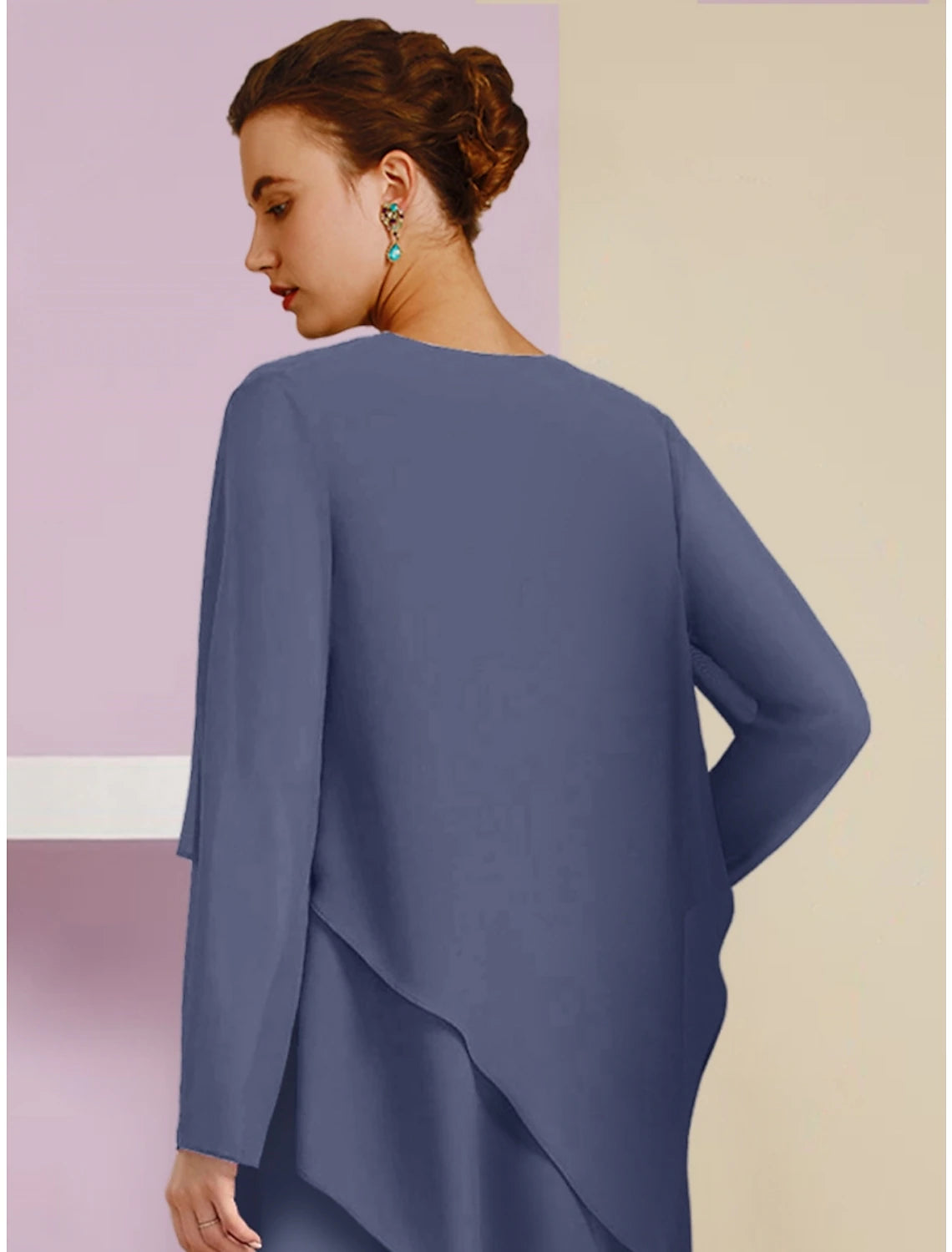 Detail of the long sleeve and ruched bodice of the formal dress.