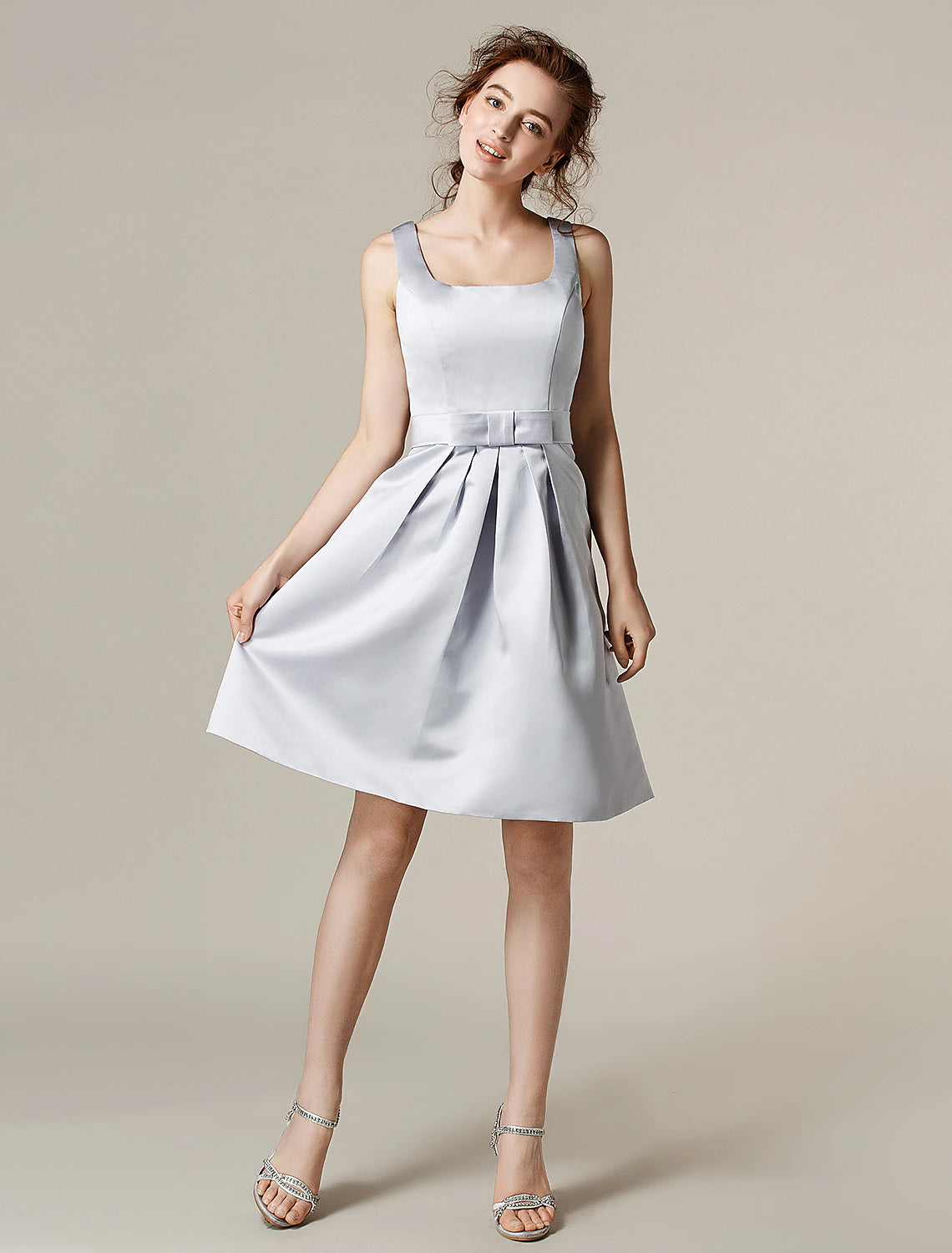 Elegant A-Line satin bridesmaid dress with square neck and knee length.