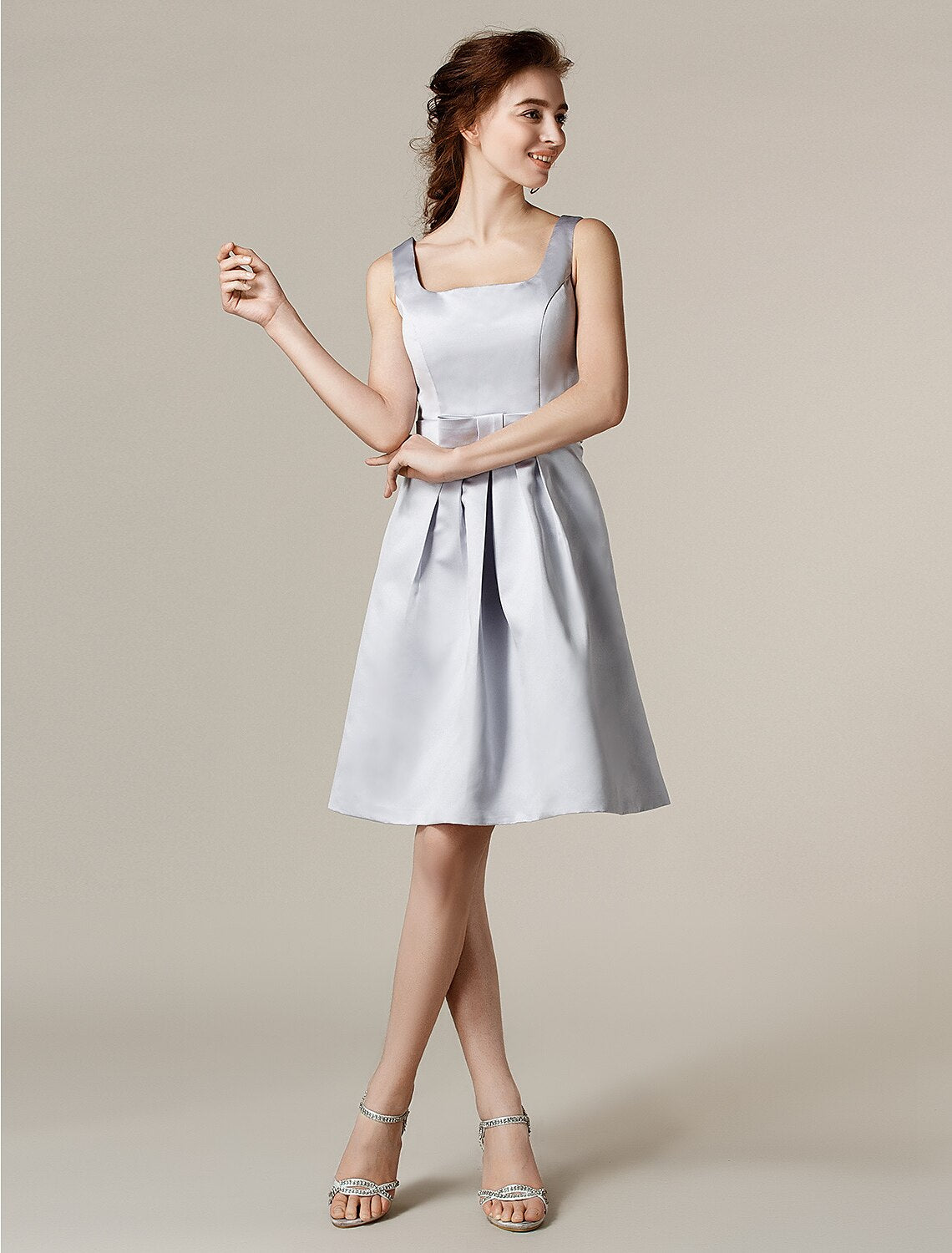 Back view of the A-Line bridesmaid dress featuring a delicate sash and bow.