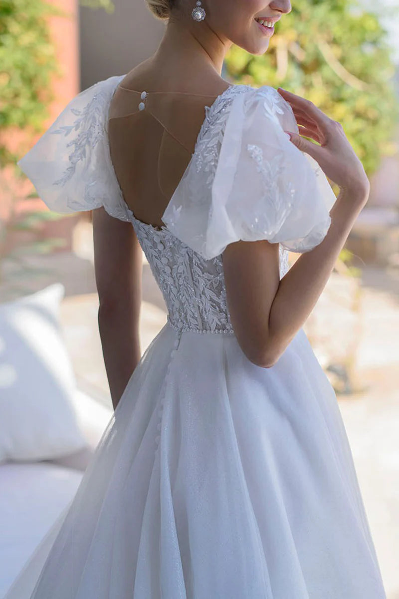Full length view of the A-line bridal gown, highlighting its silhouette.