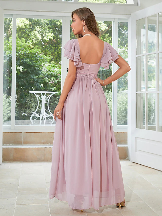 Side view of elegant chiffon party dress.