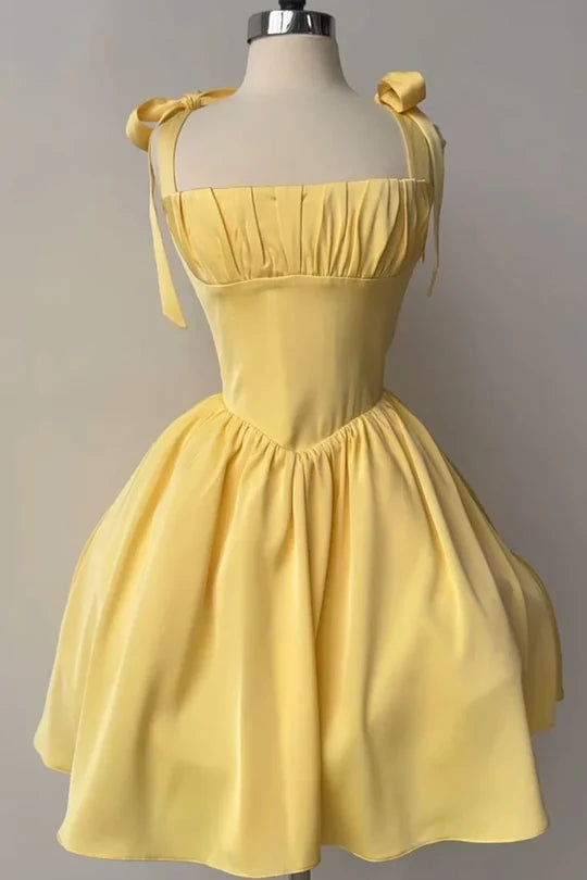 Yellow A-line short homecoming dress with square neck and straps.