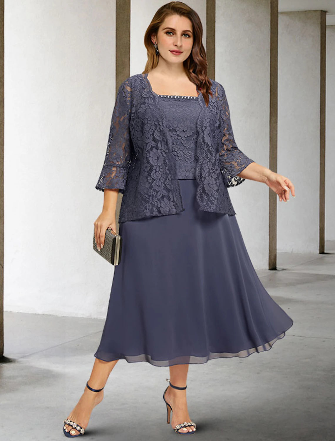 Elegant A-line mother of the bride dress with square neck and beading.