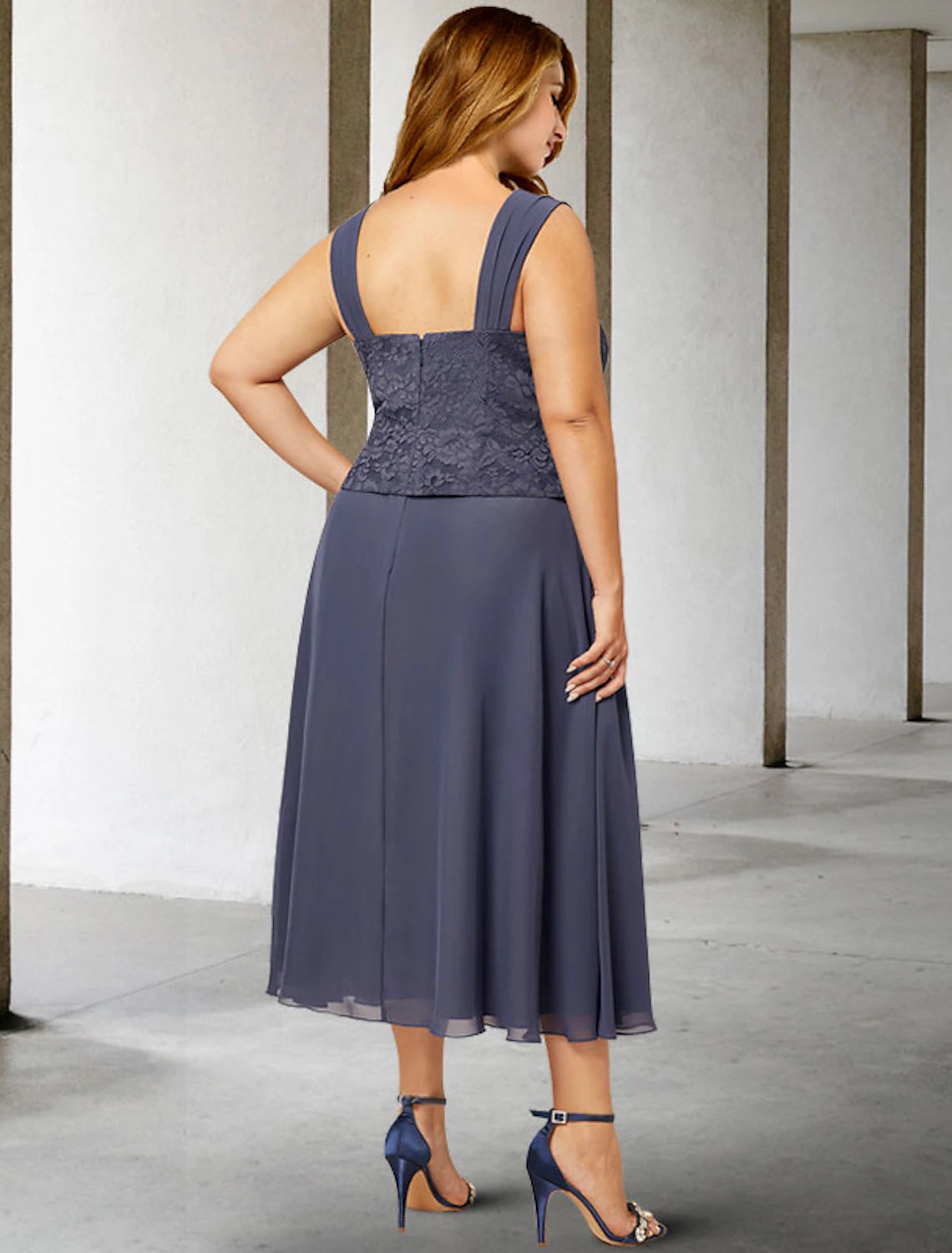 Close-up of beaded detail on the square neck chiffon dress.