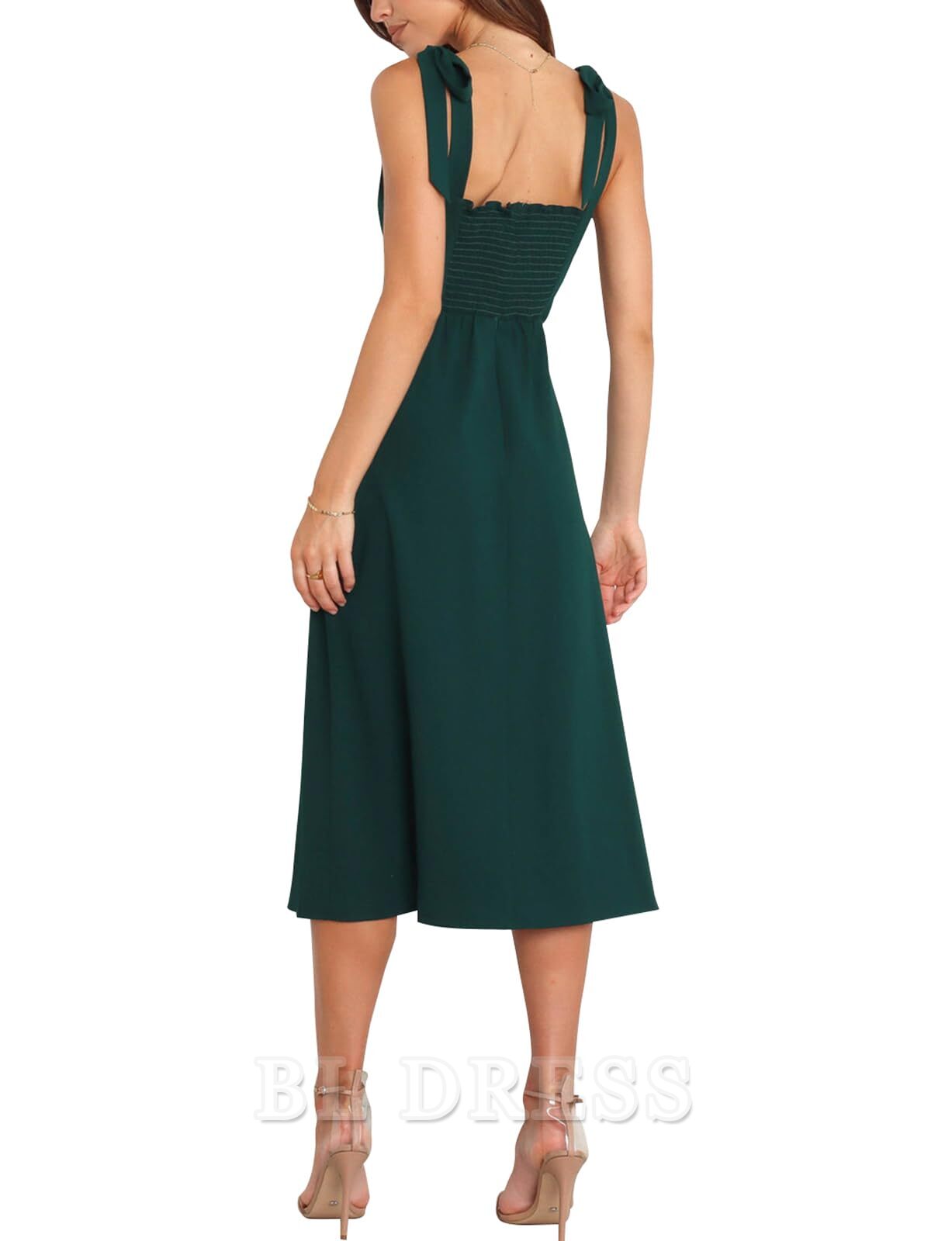 Side view of the A-line square neck formal dress, highlighting the flowing skirt and split.