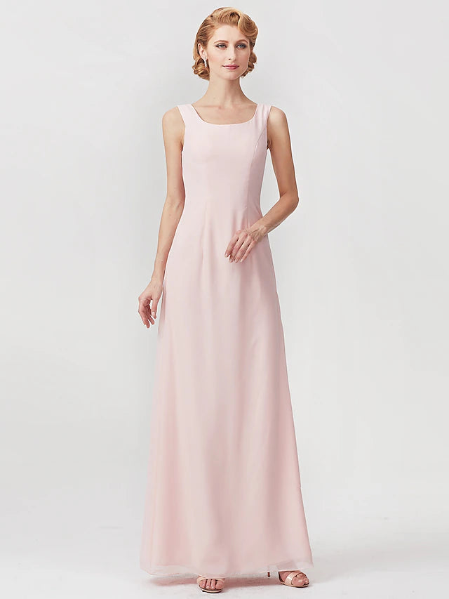Close-up of the square neckline and ruched bodice on the elegant dress.