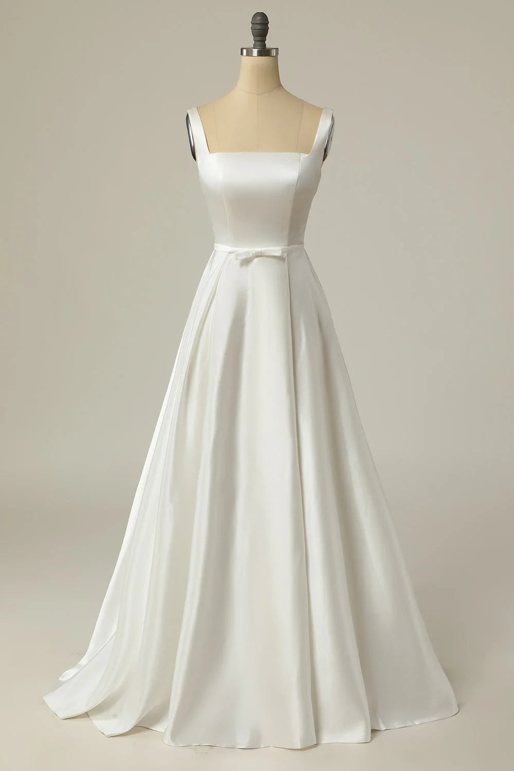 Front view of an elegant white A-line square neck long wedding dress.
