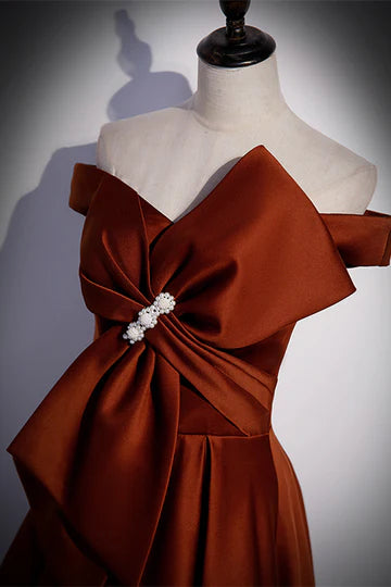 Side view of long A-line formal dress with flowing skirt.